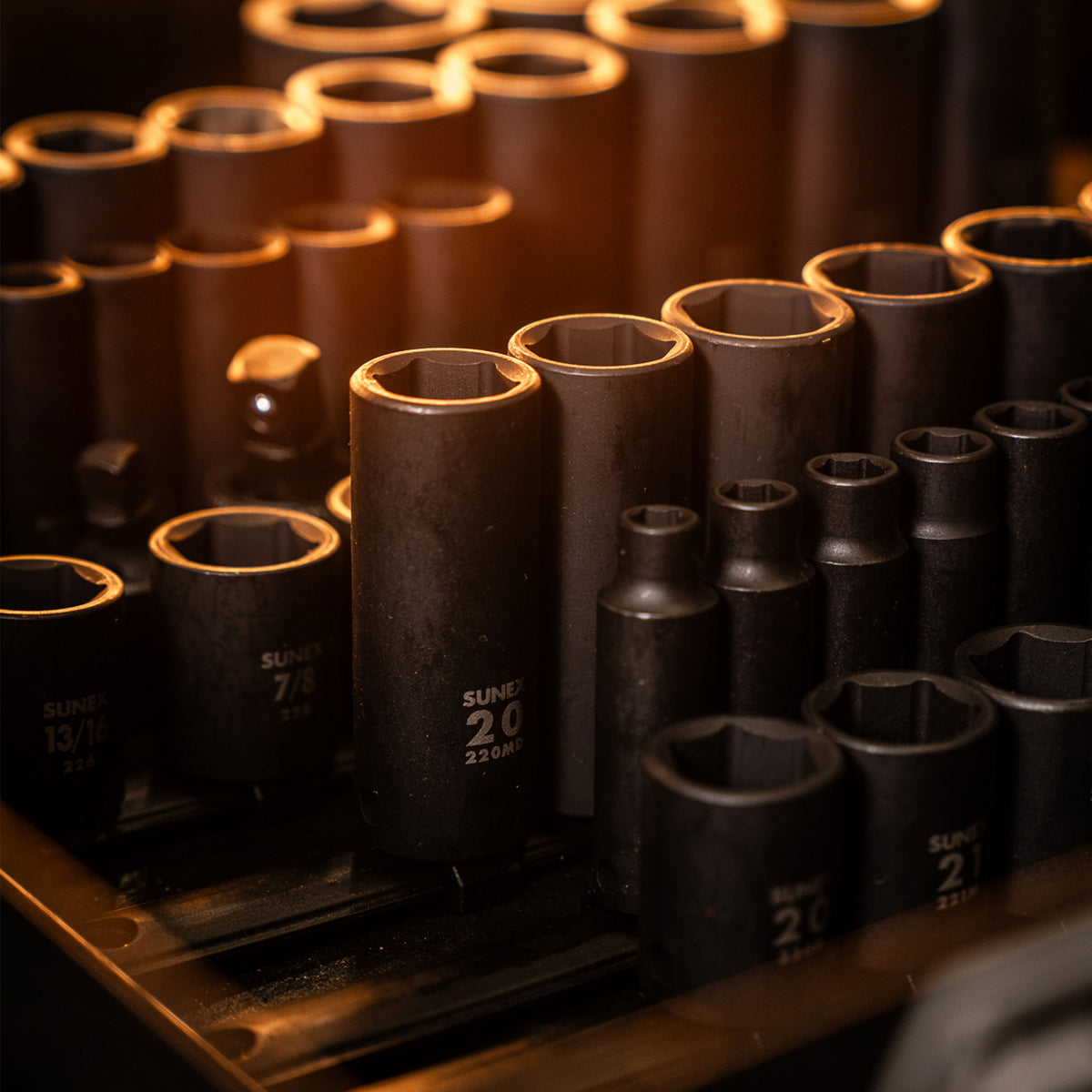 SUNEX 1/2" Drive Impact Sockets in Deep and Standard depths in a Tool Box.