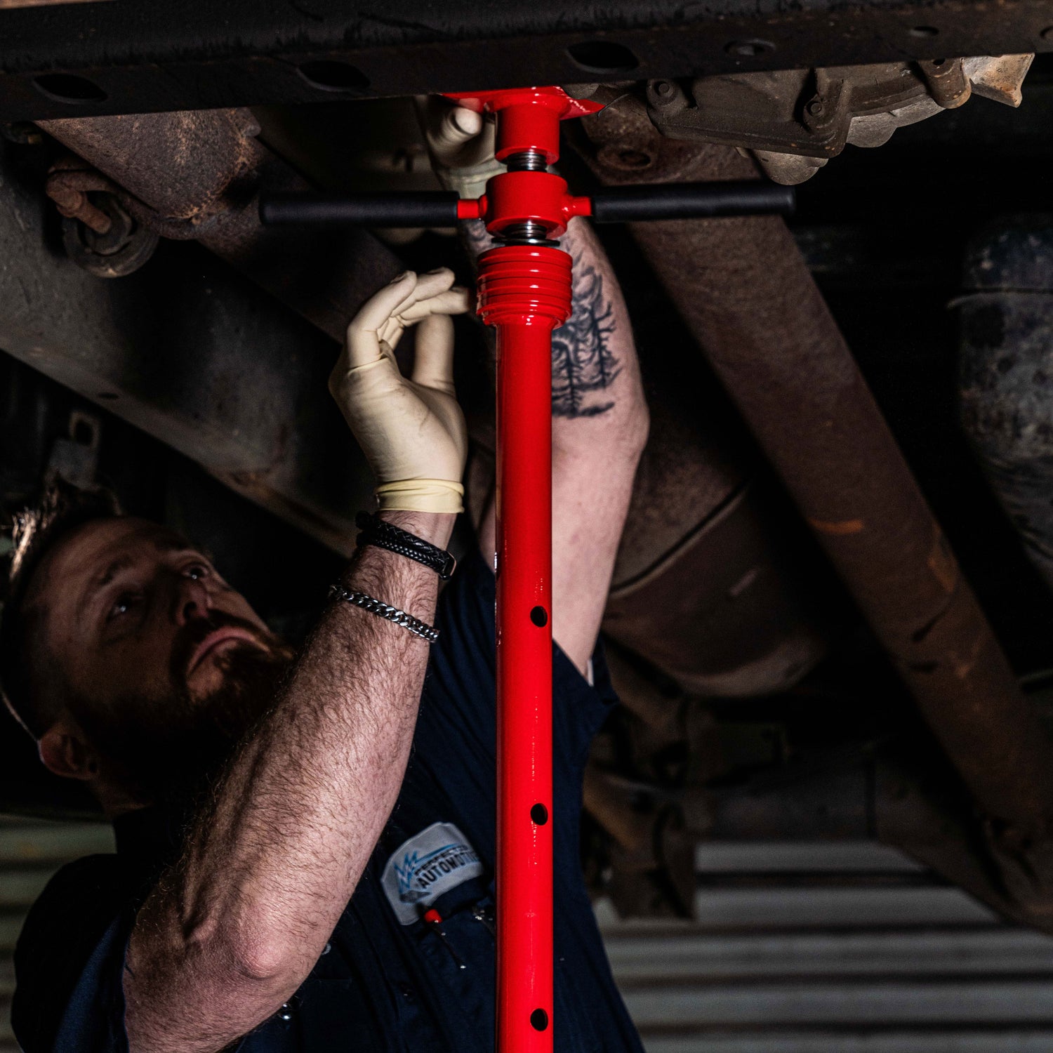 6813 Underhoist Stand being used under a vehicle