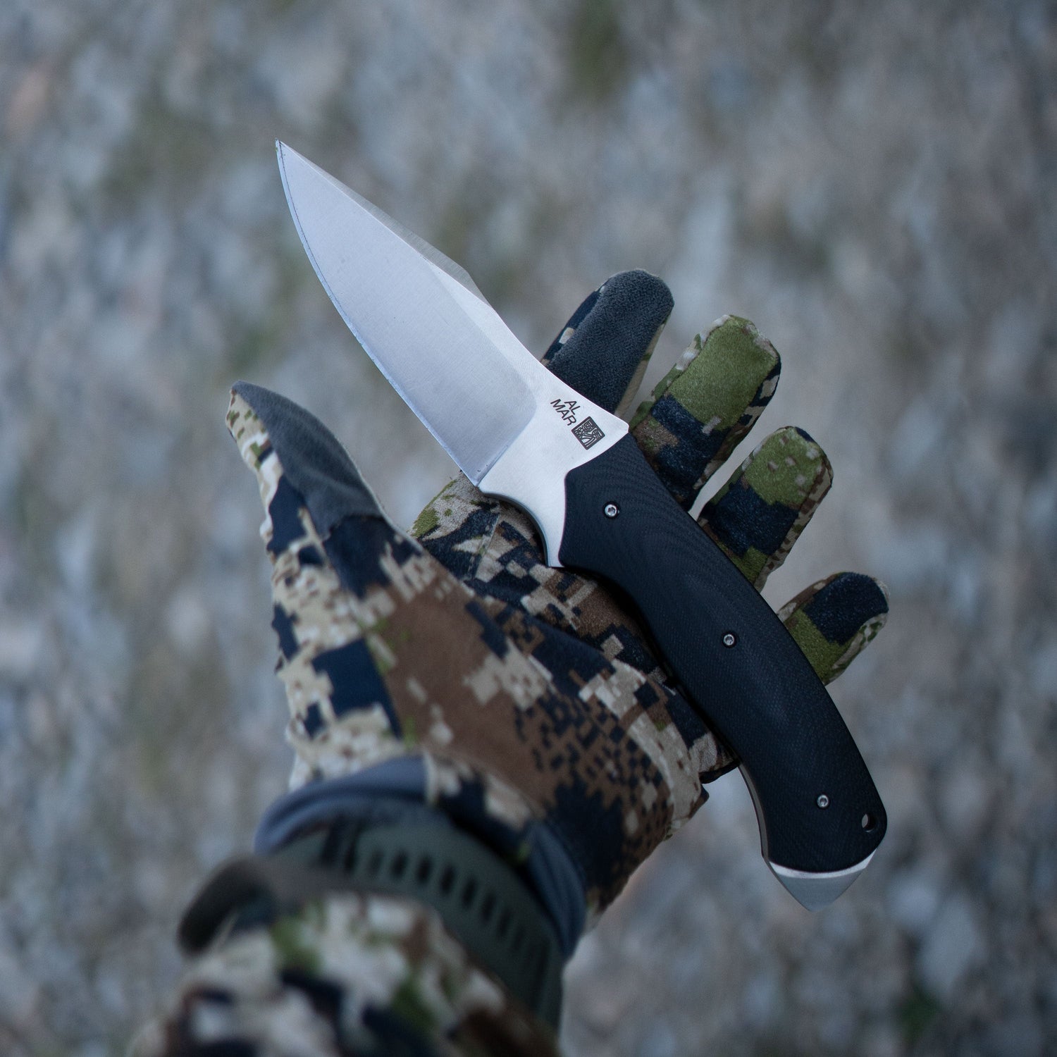 Al Mar B-21 Series Fixed Blade Knife in users gloved hand