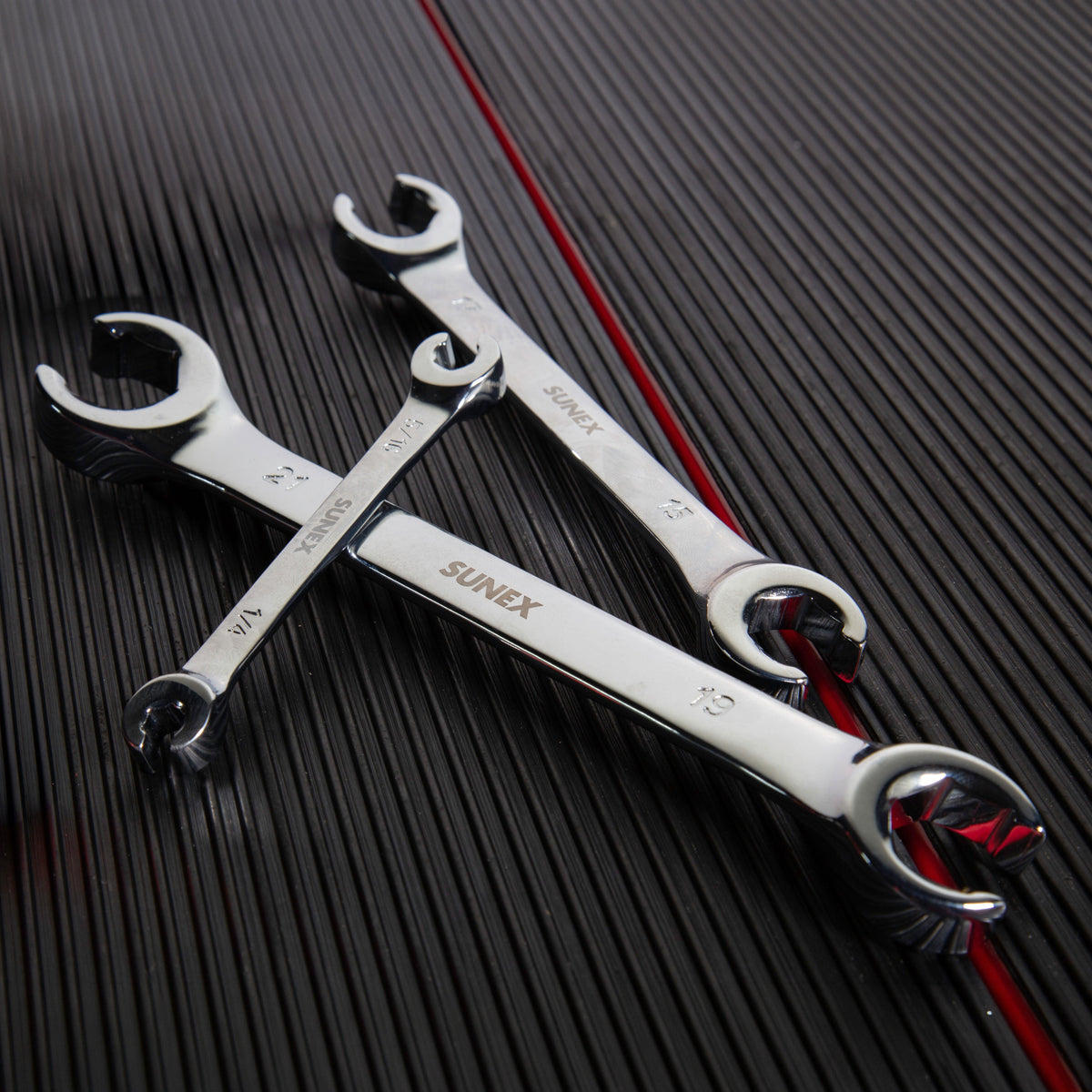 SUNEX Flare Nut Wrenches set atop a work surface.