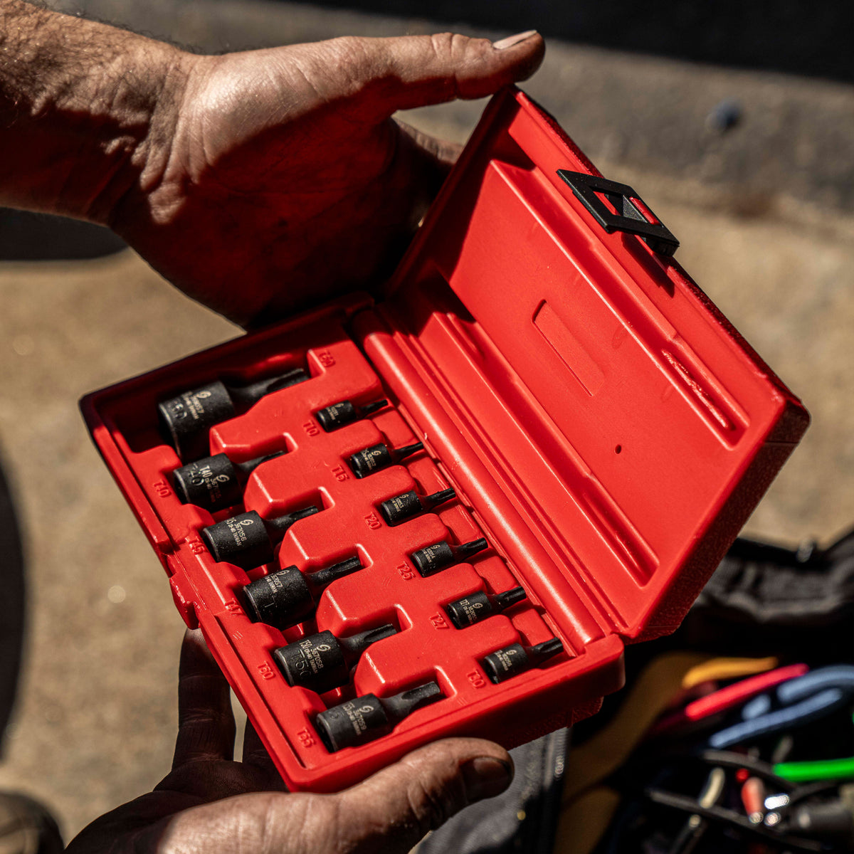 SUNEX Impact Bit Socket being used by an automotive technician.