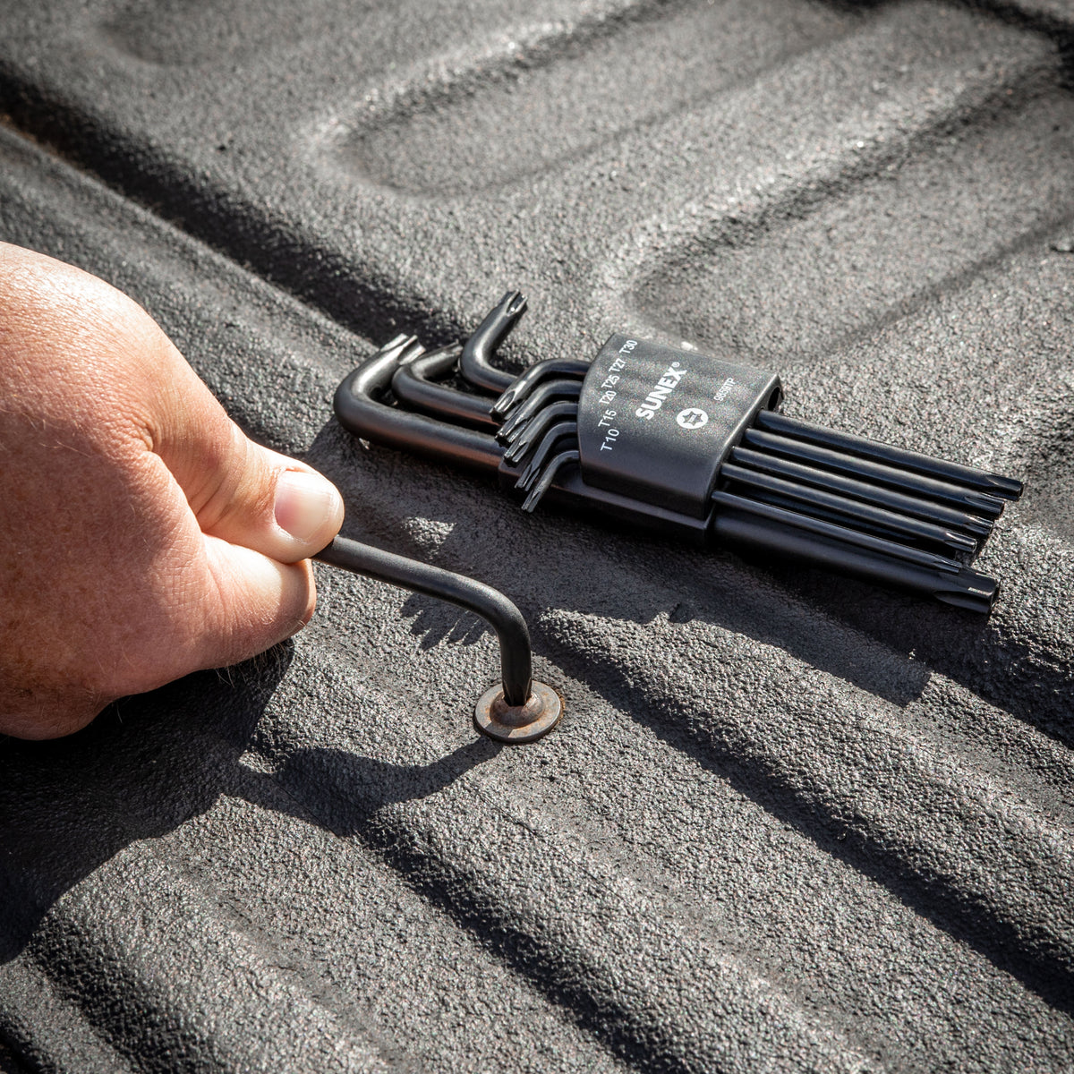 SUNEX L-Keys being used on a truck bed with a Torx L-Key.