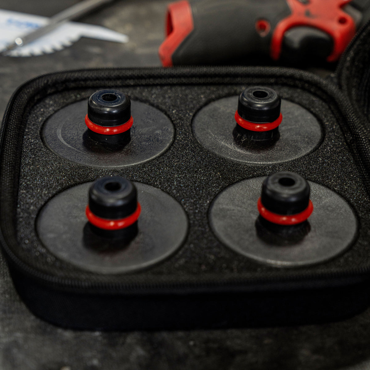 Lifting accessories showing SUNEX Tools Tesla Jack Pads.