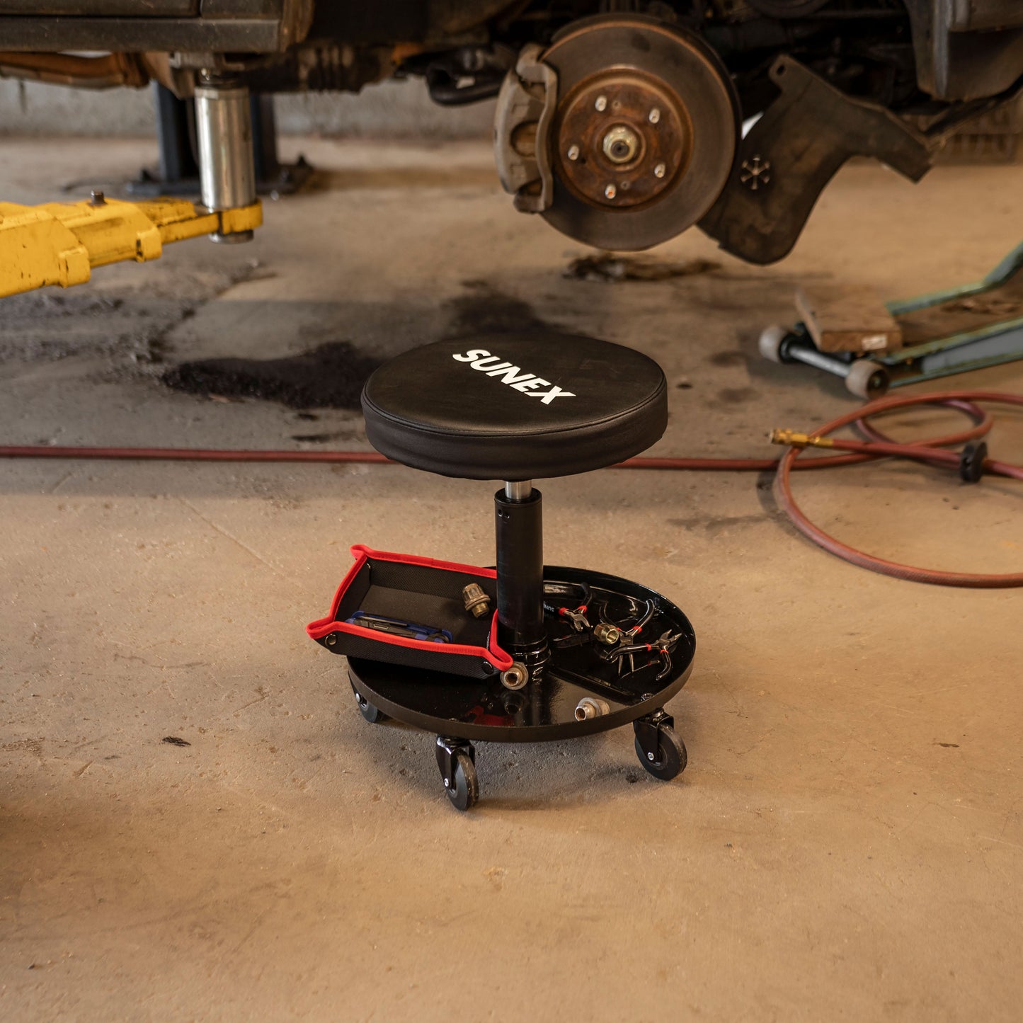 20.5” ADJUSTABLE HEIGHT SHOP SEAT WITH 1" DEEP TOOL TRAY - BLACK/RED